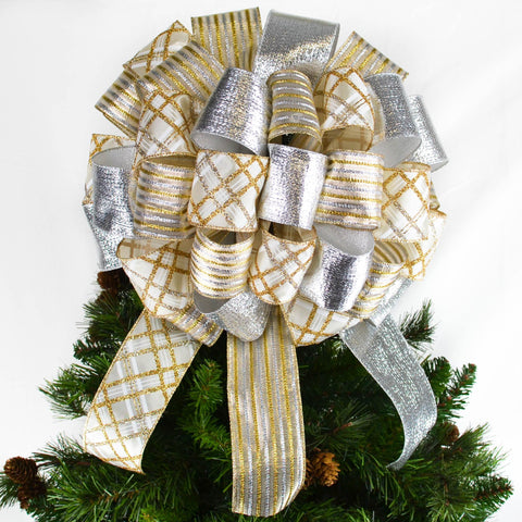 Gold and Silver Christmas Tree bow with 12 inch tails sitting atop a tree