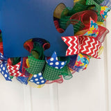 Autism Awareness Door Wreath puzzle piece; blue red yellow emerald - Pink Door Wreaths